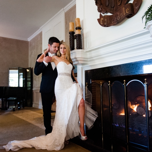 Bride and Grooma at fireplace